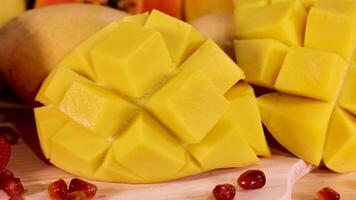 Close-up of sliced mango with assorted fruits video