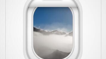 Animation reveals a serene mountain landscape through an airplane window, transitioning from interior to expansive sky view video
