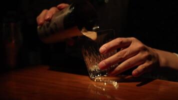 Bartender preparing a layered mixed drink video