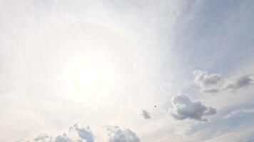 A jet flies through a bright sky with scattered clouds, creating a dynamic scene at the Avalon Airshow in Geelong, Australia video