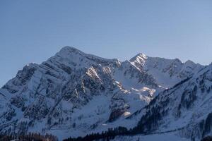 Mountains Snow Winter. Canadian Rockies panoramic view showcasing snow-covered peaks during winter. photo