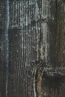 The image is of a wooden surface with a lot of texture and grain. Vertical phone wallpaper photo