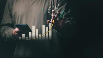 the Businessman or trader showing business growth, investing in stock market or digital assets trading, planning and strategy, progress or successful idea. photo