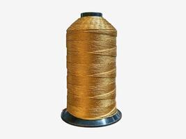 Golden Metallic Thread Spool for Craft and Textile Industry on White Background photo