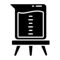 An glyph icon of chemical beaker vector