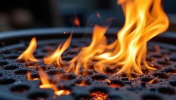 close up view of controlled fire streaming through holes in a metal fire grate. photo