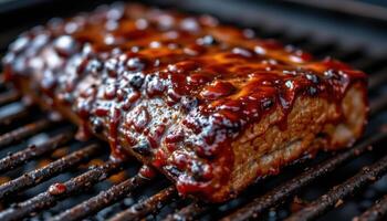 close up view of sizzling bbq short ribs dripping with glaze and resting on a blackened iron surface. photo