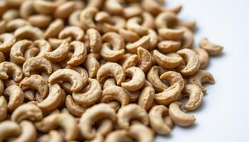 close up view of caraway seeds with ridged surface and crescent shapes arranged in diagonal lines. photo