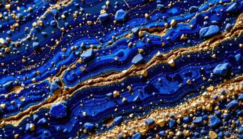 close up view of a lapis lazuli slab with deep blue body and golden pyrite specks. photo