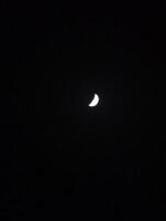 Waxing crescent moon photography at night sky celestial event astronomy space exploration dark background photo