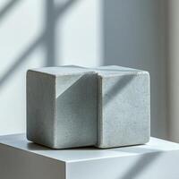 Empty podium display featuring stone cubic product pedestal showcasing minimalistic design, perfect for cosmetics or decorative items on a bright surface photo