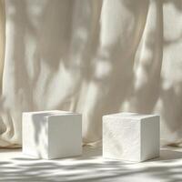 Empty podium and product pedestal composed of stone cubic structures positioned elegantly on a minimalistic background that highlights their textures and shadows photo