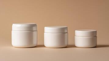 Various sizes of white moisturizer jars arranged neatly on a soft beige background in a minimalist setting photo