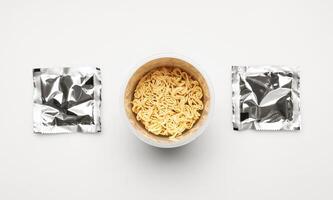 Instant noodles set on a white back photo