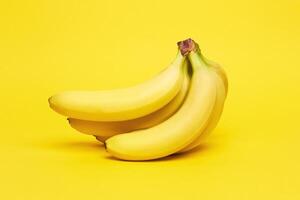 Bananas on yellow background photo