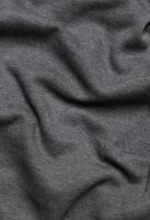 Grey textile wave texture closeup photo