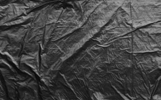 Black plastic wrap texture background photo
