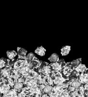 Ice cubes isolated on a black photo