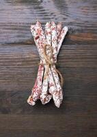Salami sausages on a wood photo