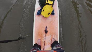 A person on a surfboard in the water video