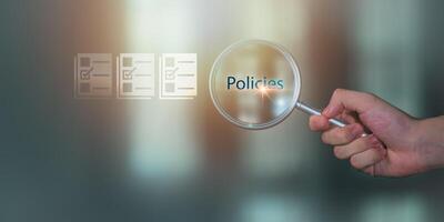 professional meticulously reviews multiple virtual documents, photo