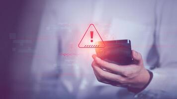 Programmer and virtual icons , exclamation mark ,alarm,computer virus detected ,danger warning concept or information error that should be urgently fixed and repaired photo