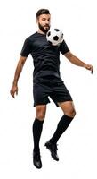A man in black soccer uniform is holding a soccer ball photo