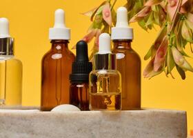 Bottles of essential skincare oils photo