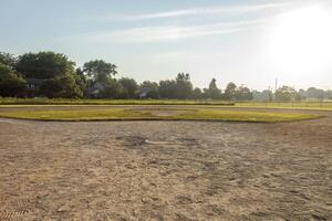 a view of the infield and outfield of diamond two at dawn photo