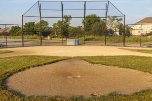 a view of the backstop and homeplate from the pitchers mound on diamons two photo