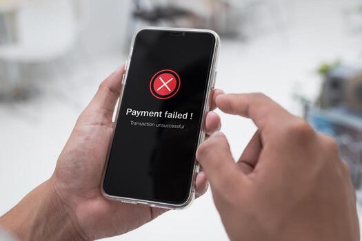 Payment failed, declined. Online financial transaction notification with red cross in application showing error on smartphone. Concept of online banking, transaction encryption and secure connection. photo