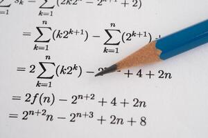 mathematic formula exercise test paper in education school. photo