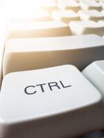 White CTRL button on mechanical white keyboard, business concept, for advertising photo