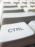 White CTRL button on mechanical white keyboard, business concept, for advertising, for banners photo