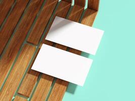Clean white business card on wooden slats, providing a minimalist look. photo