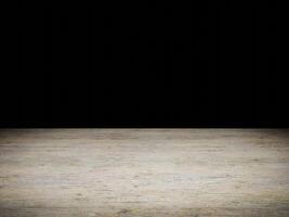 Bright wooden surface with intricate patterns set against an empty black background. photo