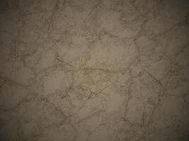 Soft beige marble texture with subtle veining. photo