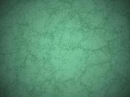 Light grey marble background with smooth texture and fine veins. photo