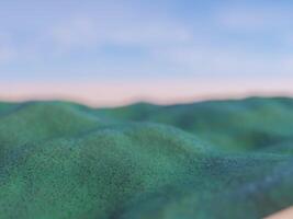 Soft sand dunes on the beach with a blurred ocean background during sunset. photo