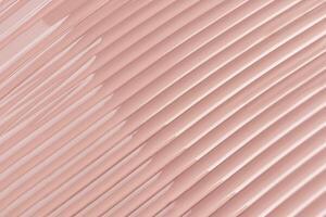 Chic cosmetic background texture of liquid foundation powder in natural tone. delicate parallel stripes. natural highlights of the texture. Layout. photo