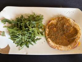 Mexican breakfast with arugula salad photo