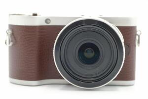 Classic mirrorless camera with a vintage design and modern features, ideal for photography enthusiasts photo