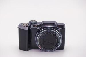 Compact digital camera with sleek design, ready for capturing memorable moments in various settings photo