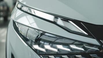 Close-up of car headlights. An advanced design concept that improves visibility, demonstrates innovation and adds style to night driving. photo