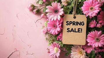 tag that says Spring Sale on a pink background with space for text. photo