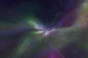 Emerald aurora arcs across the night sky reflecting faintly in the meandering waterway below. photo