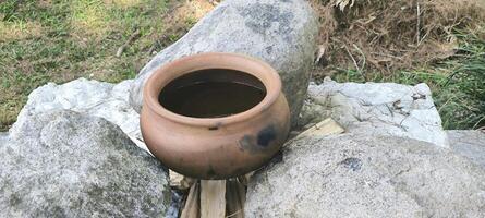 A photo of Hudon Tano vessel from Batak Toba tradition, a cultural container symbolizing ritual connection to the earth, ancestral respect, and sacred practices.