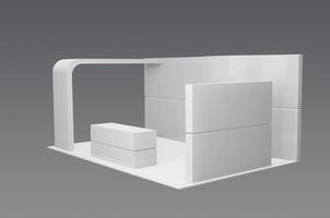A white display booth with a table and chair photo