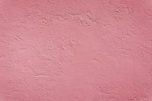 Beautiful uneven pink texture. Neutral decorative pink background. photo