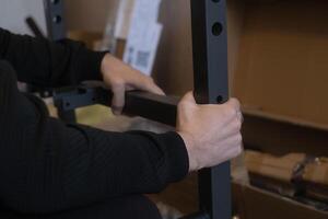 Assembling sports equipment at home for convenient and organized home fitness workouts and exercise routines. photo